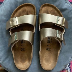 Metallic gold Arizona Birkenstocks birko floor footbed